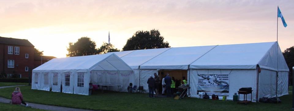 an evening meeting at the newbold tent mission